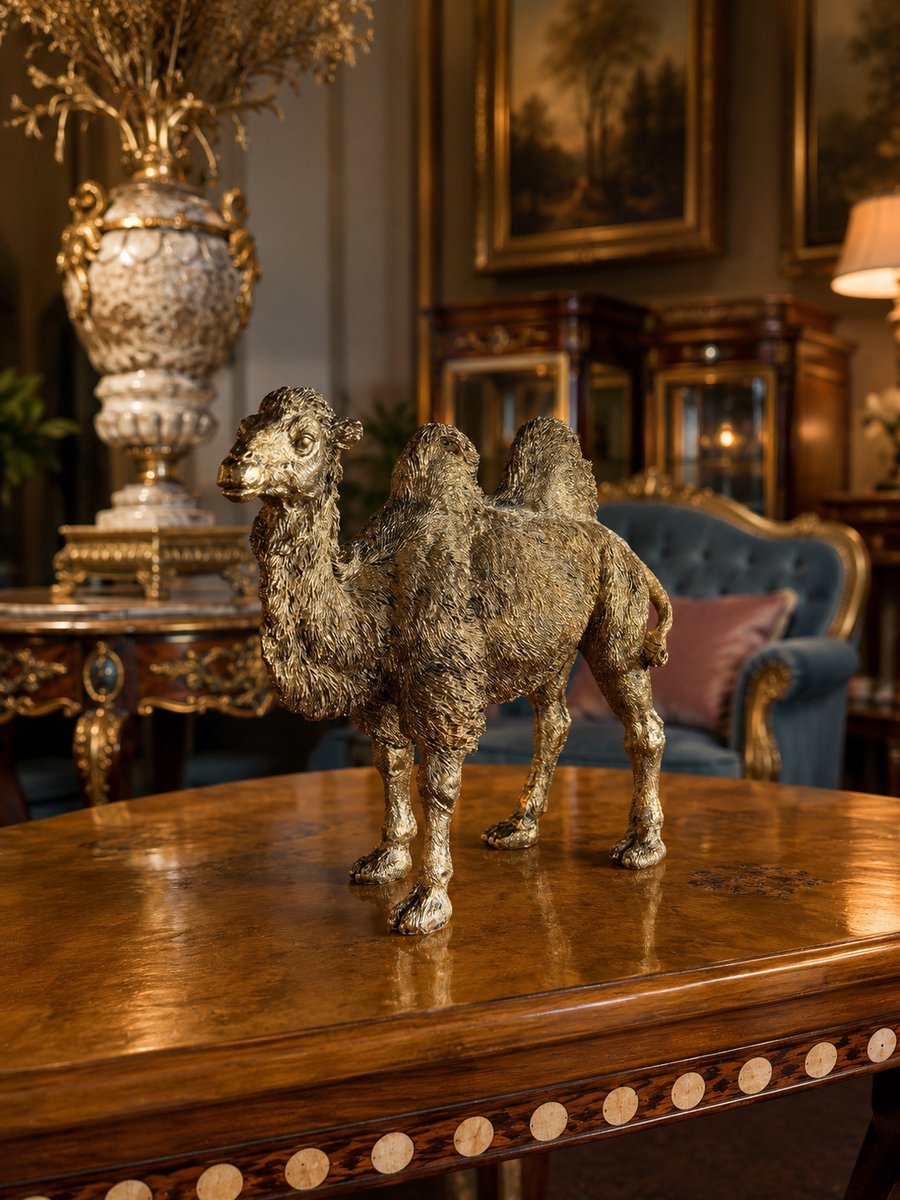 kameel beeld goud
