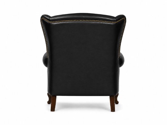 Zwarte Chesterfield fauteuil, achterkant, met gouden studs langs de rugleuning en armleuningen.
