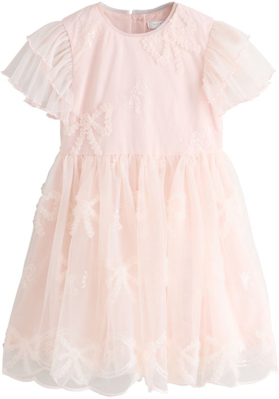 Roze feestjurk van mesh met korte, ruches mouwen, strikdecoraties en pailletten op de rok.