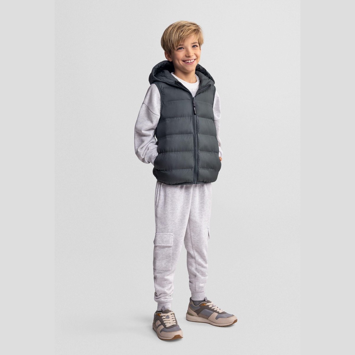 Minoti gewatteerde bodywarmer jongens met capuchon gevoerd Groen