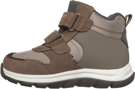 Bruine sneaker met klittenbandsluitingen en gestreepte stofdetails.