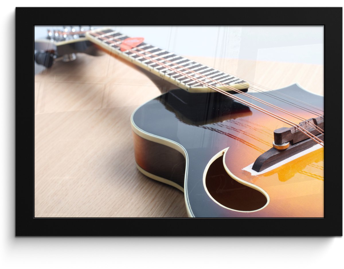 Poster in lijst - Fotolijst 30x20 cm - Posters - Een elektrische gitaar op een houten vloe