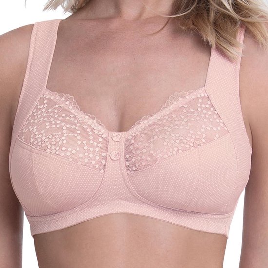 Lichtroze beha met stippenpatroon en kanten details op de cups en bandjes. Sluiting met twee knoopjes.