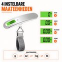 Digitale kofferweegschaal met zilverkleurige handgreep en grijze stoffen lus, toont de 4 instelbare eenheden: gram, ounce, kilogram en pond.