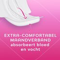 Wit maandverband dat bloed en vocht absorbeert. Roze achtergrond met pijl-details.
