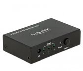 Zwarte Delock HDMI UHD schakelaar 3x1 met IR, 3 groene indicatielampjes en Select knop.