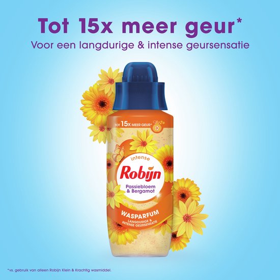 Fles Robijn Intense Wasparfum Passiebloem & Bergamot met 15x meer geur en omringd door gele bloemen.