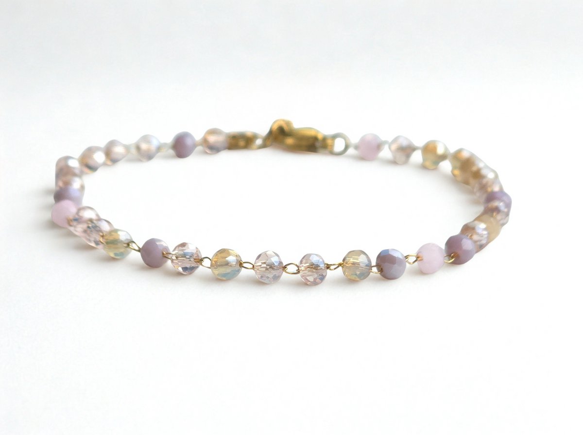 Stainless Steel Armband met Gemengde Pastel Gekleurde Kristallen - Goudkleurig - The Jewellery Salon - Fijne damesarmband