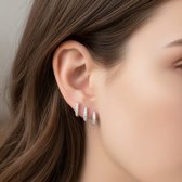 Bohm Paris Goud dubbele oorbellen met swarovski steentje koraal