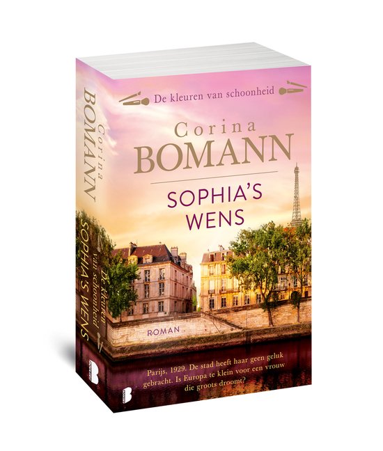 Boek "Sophia's wens" van Corina Bomann. De cover toont Parijs bij zonsondergang met de Eiffeltoren op de achtergrond.