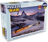 Puzzel Trein door het besneeuwde landschap in Zwitserland bij zonsopkomst - Legpuzzel - Puzzel 500 stukjes