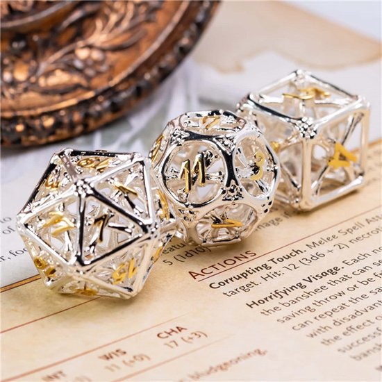 Thumbnail van een extra afbeelding van het spel DND Hollow metal dice set - Hollow bone serie - DnD dobbelstenen set Wit goud - Dungeons and Dragons dobbelstenen Inclusief Leren bewaarzakje en lux doosje