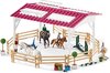 foto van schleich ruiterschool met ruiter en paarden