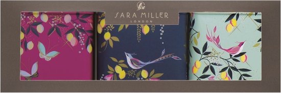 Trois boîtes avec des imprimés d'oiseaux et de papillons en violet, bleu marine et vert menthe. Sara Miller London.