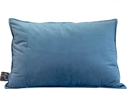 Rechthoekig blauw fluwelen warmtekussen met rits aan de zijkant.