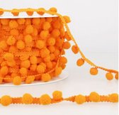 Lint 1 meter oranje met pompons - 8mm diameter - Stoffenboetiek