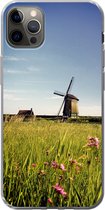 Geschikt voor iPhone 12 Pro Max hoesje - Een molen met bloemen - Siliconen Telefoonhoesje