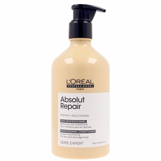 L'Oréal Professionnel Absolut Repair conditionneur avec distributeur à pompe. Bouteille beige avec étiquette blanche.