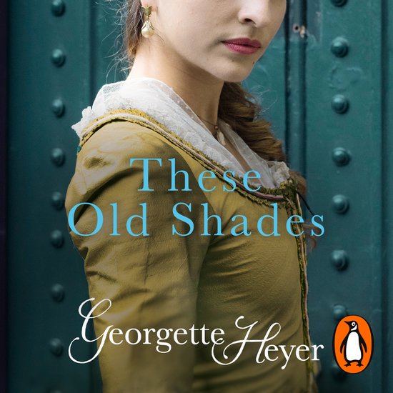 Een vrouw draagt een olijfgroene jurk met een kanten kraag. De titel "These Old Shades" staat in blauwe letters op de jurk.