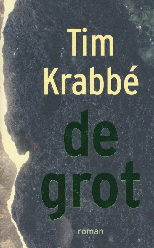 Boek "de grot" van Tim Krabbé met een donkergrijze, rotsachtige achtergrond.