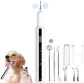 Elektrische tandsteenverwijderaar met toebehoren, een golden retriever en een kat.