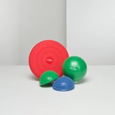 Mambo Max set met rode balance disc, groene bal, en twee halfronde stapstenen.