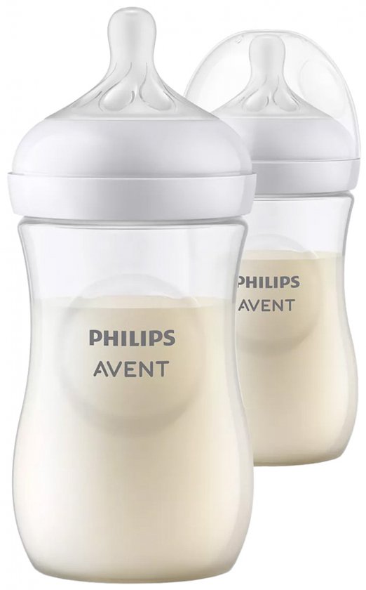 Deux biberons Philips Avent avec tétines et capuchon blancs, remplis de lait.