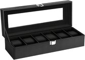 Zwarte horlogebox met 6 vakken, opengeklapt, met glazen deksel en metalen sluiting.