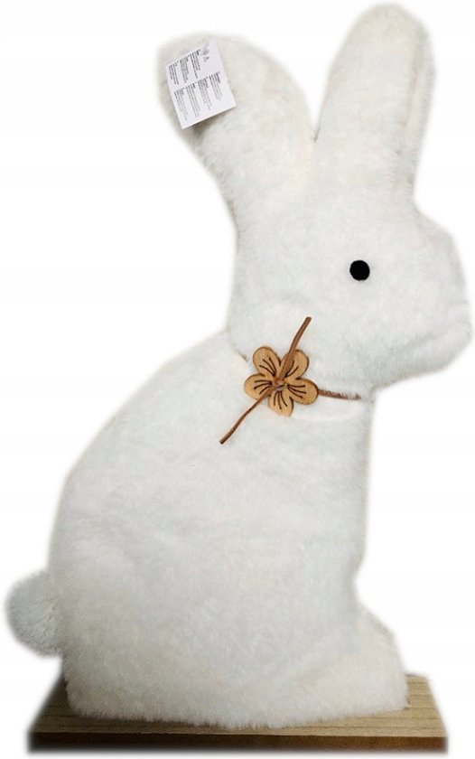 Paaspluche konijn op een houten standaarddecoratie