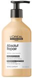 L'Oréal Professionnel Absolut Repair conditionneur avec distributeur à pompe. Bouteille beige avec étiquette blanche.