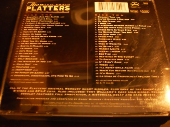 Achterkant van de CD "The Magic Touch" van The Platters met tracklijsten voor Disc One en Disc Two.