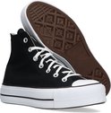 Zwarte Converse Chuck Taylor All Star Lift sneakers met witte veters, witte zool en bruine loopzool met ruitpatroon.