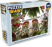 Puzzel Rode bloemen aan de muur in het Spaanse Córdoba - Legpuzzel - Puzzel 500 stukjes