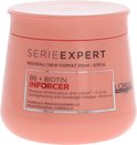 Een peachy-roze pot met het L'Oréal Serie Expert Inforcer masker met een zwart deksel.