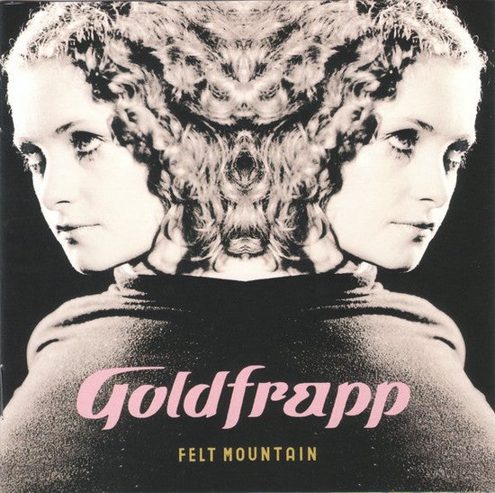 Dubbele weergave van een vrouw met krullend blond haar en donkere kleding, met de tekst 'Goldfrapp FELT MOUNTAIN'.