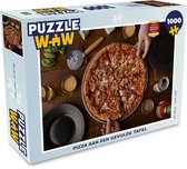 Puzzel Pizza aan een gevulde tafel - Legpuzzel - Puzzel 1000 stukjes volwassenen