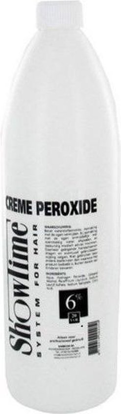 Showtime Creme Peroxide 6% (20vol) 500ml: een witte fles met zwarte tekst.