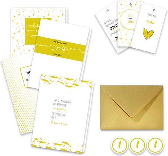 Gouden brievenkaart set met diverse kaarten, een envelop en ronde stickers met veer-afbeelding.