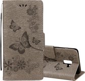 Voor Galaxy A8 (2018) Vintage reliÃ«f bloemen vlinderpatroon Horizontale flip lederen tas met kaartsleuf en houder & portemonnee en lanyard (grijs)