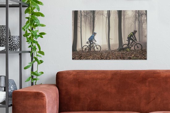 En VTT sur un chemin forestier 90x60 cm - Tirage photo sur toile (Décoration murale salon / chambre)