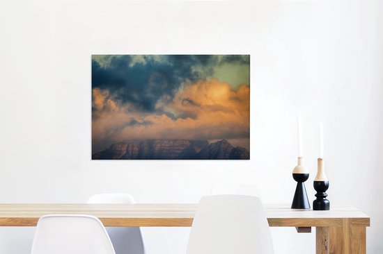 Canvas Schilderij De zon schijnt door de wolken boven de Tafelberg in Zuid-Afrika - 60x40 cm - Wanddecoratie