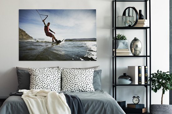 Un homme wakeboard sur toile d'eau de mer calme 120x80 cm - Tirage photo sur toile (Décoration murale salon / chambre)
