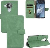 Voor Nokia 7.3 Effen Kleur Huid Voelen Magnetische Gesp Horizontale Flip Kalf Textuur PU Lederen Case met Houder & Kaartsleuven & Portemonnee (Groen)