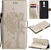 Voor Nokia 2.4 Tree & Cat Pattern Pressed Printing Horizontale Flip PU Leather Case met Houder & Kaartsleuven & Portemonnee & Lanyard (Goud)