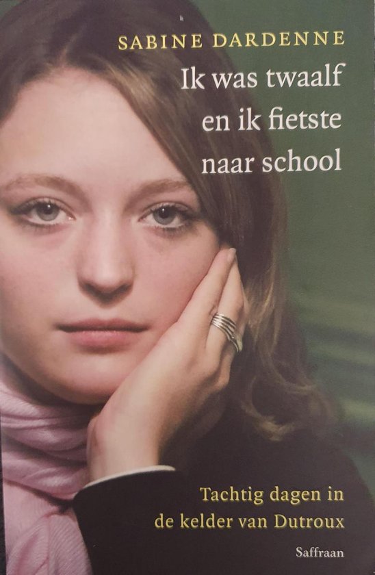 Boekomslag met portret van Sabine Dardenne, getiteld 'Ik was twaalf en ik fietste naar school'.