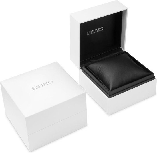 Open witte Seiko horlogedoos met zwart kussen, gesloten witte doos ernaast.