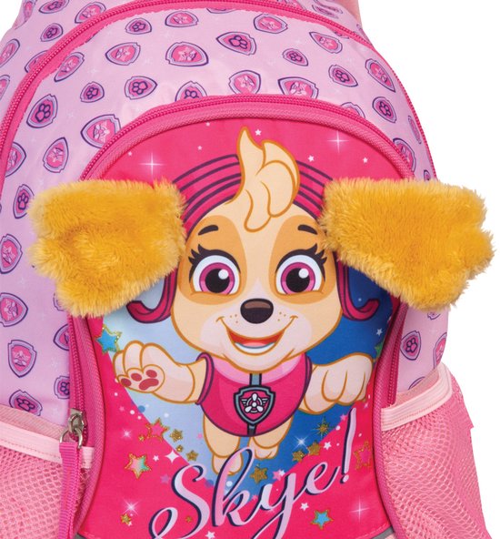 Sac à dos rose avec Skye, "Skye !" en lettres scintillantes et oreilles jaunes.