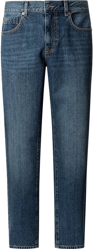 Taps toelopende spijkerbroek in middelblauwe denim met licht waseffect en gele stiksels.