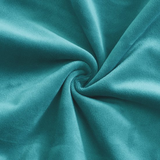 Gladde, turquoise fluwelen stof in een gedraaide spiraalvorm.