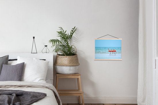 Affiche textielposter Quatre flamants roses sont sur la plage 40x30 cm - petite